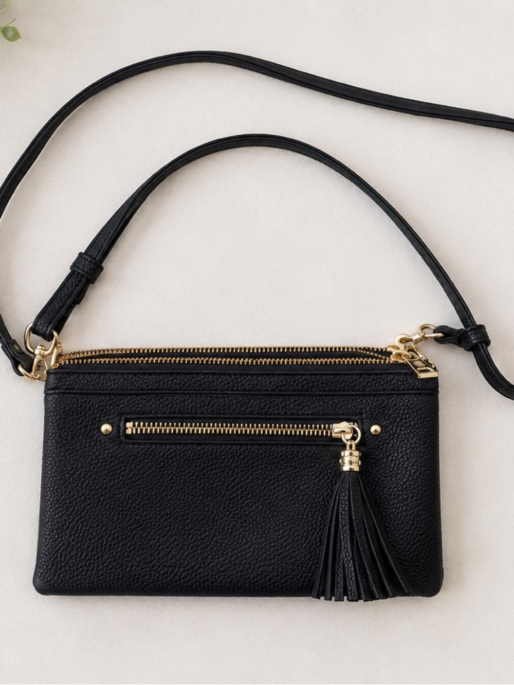 Black Pebbled Faux Leather Crossbody Bag With Tassel Accent